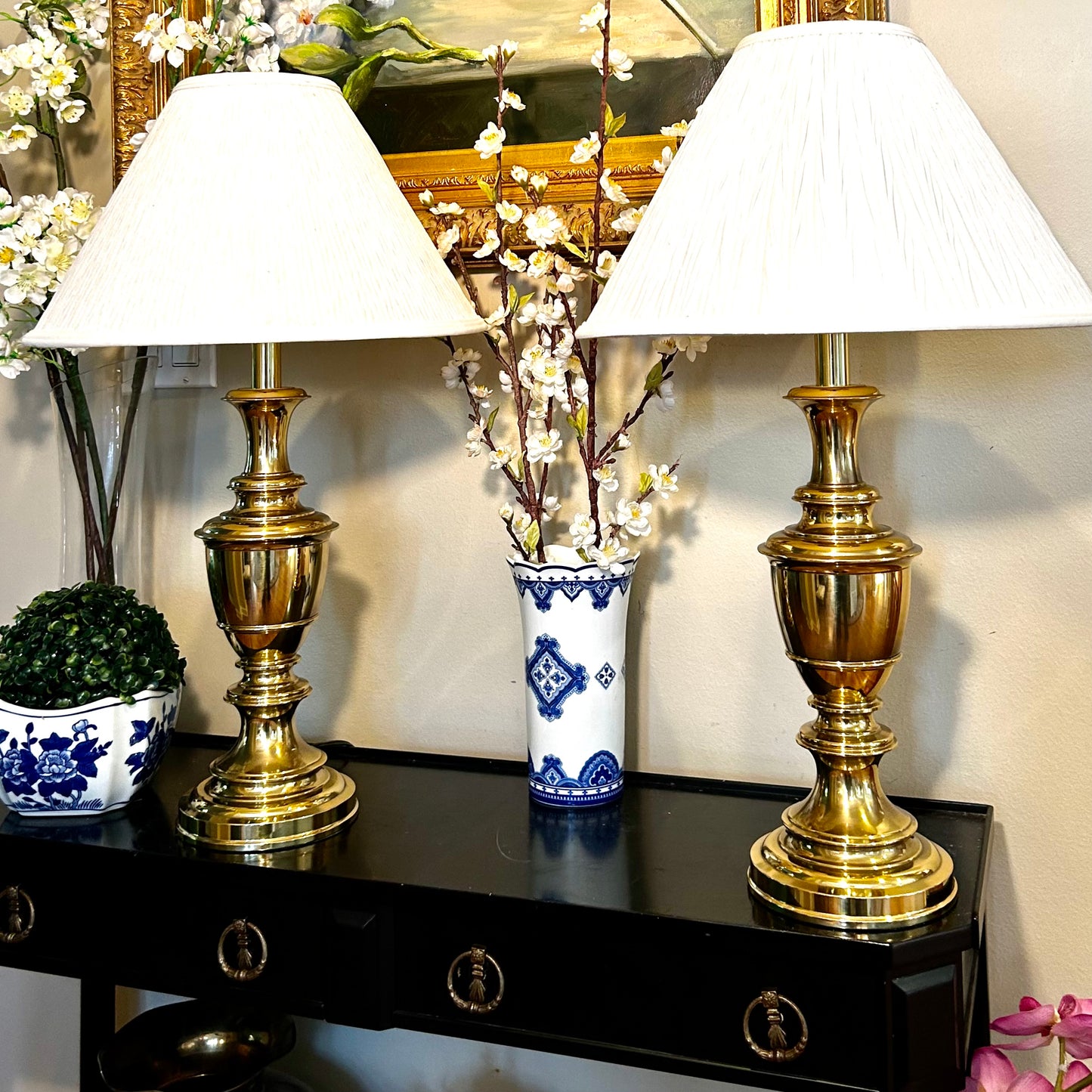 Pair of chic & shiny heavy brass vintage lamps.