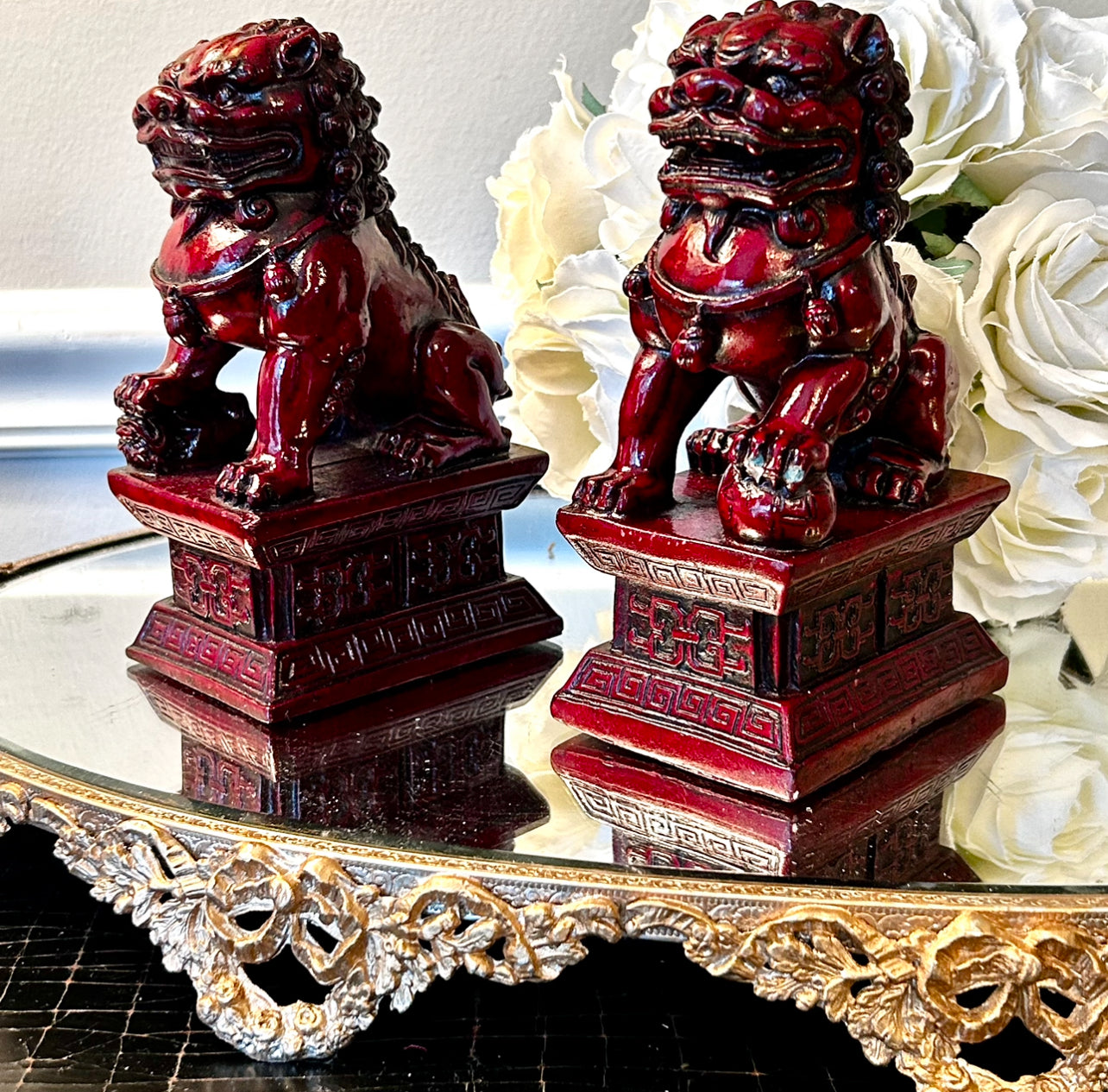 Rich ruby red hand carved older vintage pair of wood foo dog statues