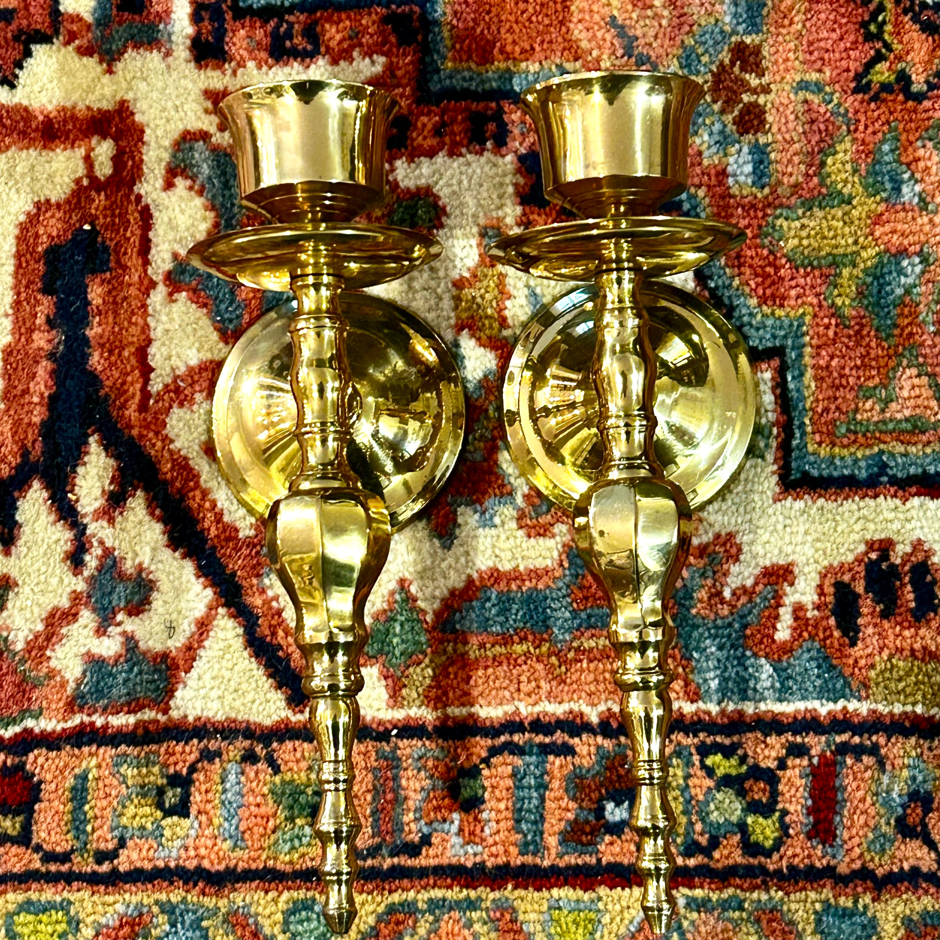 Brass candle sconces top