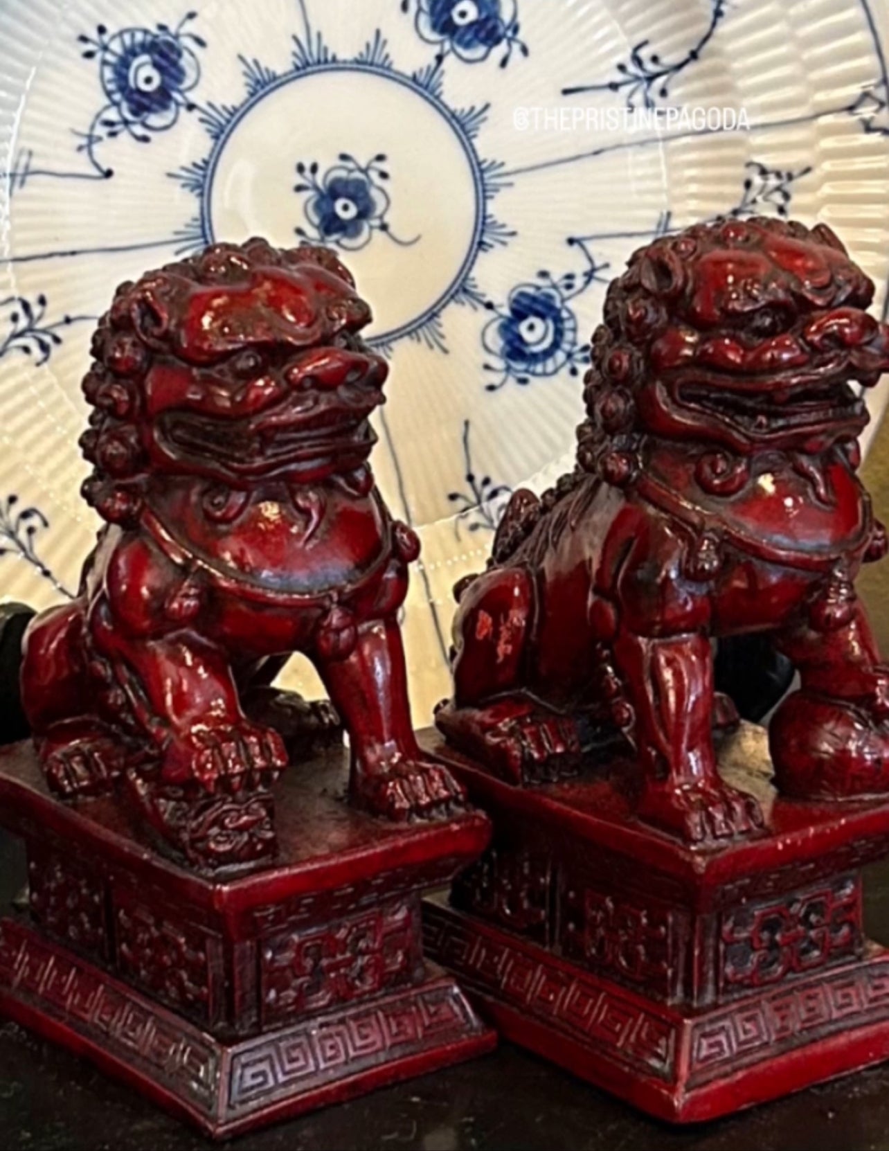 Rich ruby red hand carved older vintage pair of wood foo dog statues