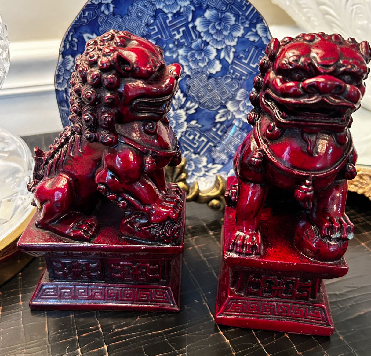 Rich ruby red hand carved older vintage pair of wood foo dog statues