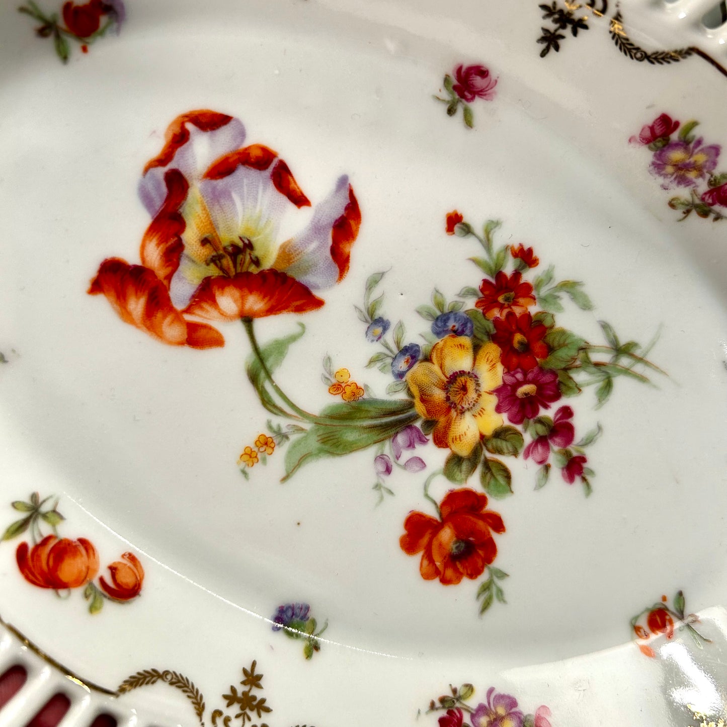 Gorgeous hand painted reticulated Germany porcelain floral bowl