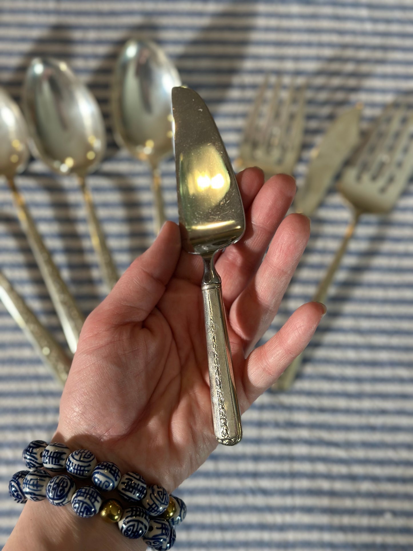 Antique Sterling “Ramker Rose” by Towle. 8 pcs. Total. Butter knife, pie server, (4) serving spoons, (2) meat forks included.