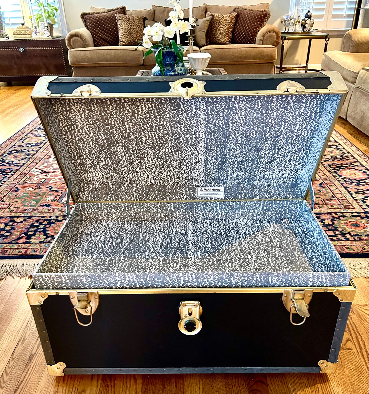 Handsome vintage  ebony black, Brass & leather storage trunk w handles steamer trunk coffee table .