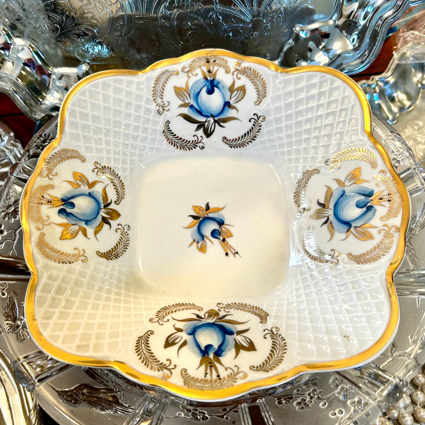Beautiful blue and white floral lattice scalloped bowl with gold trim