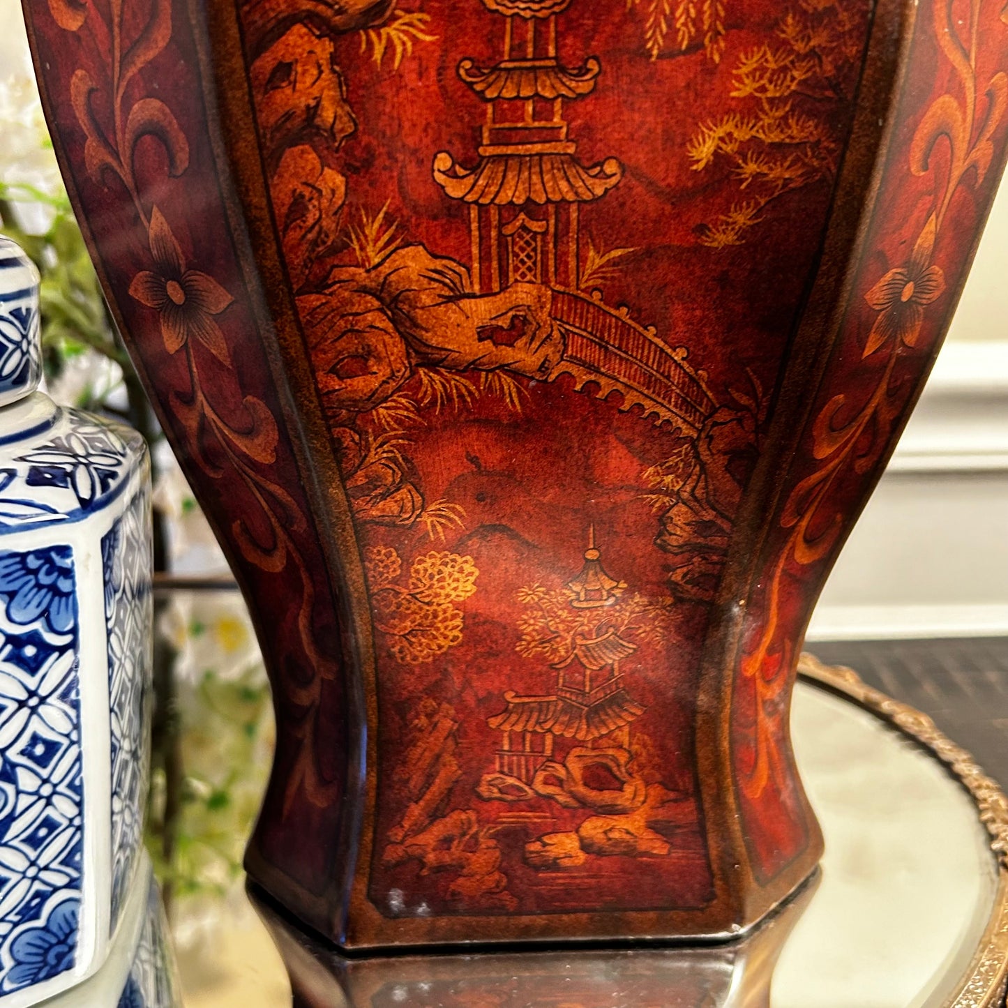 Set of two chinoiserie pagoda statuesque pagoda vases jars plus lids.