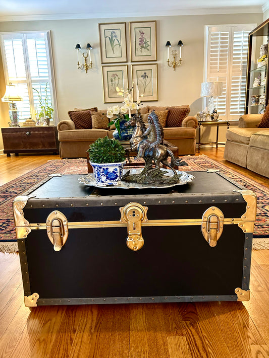 Handsome vintage  ebony black, Brass & leather storage trunk w handles steamer trunk coffee table .
