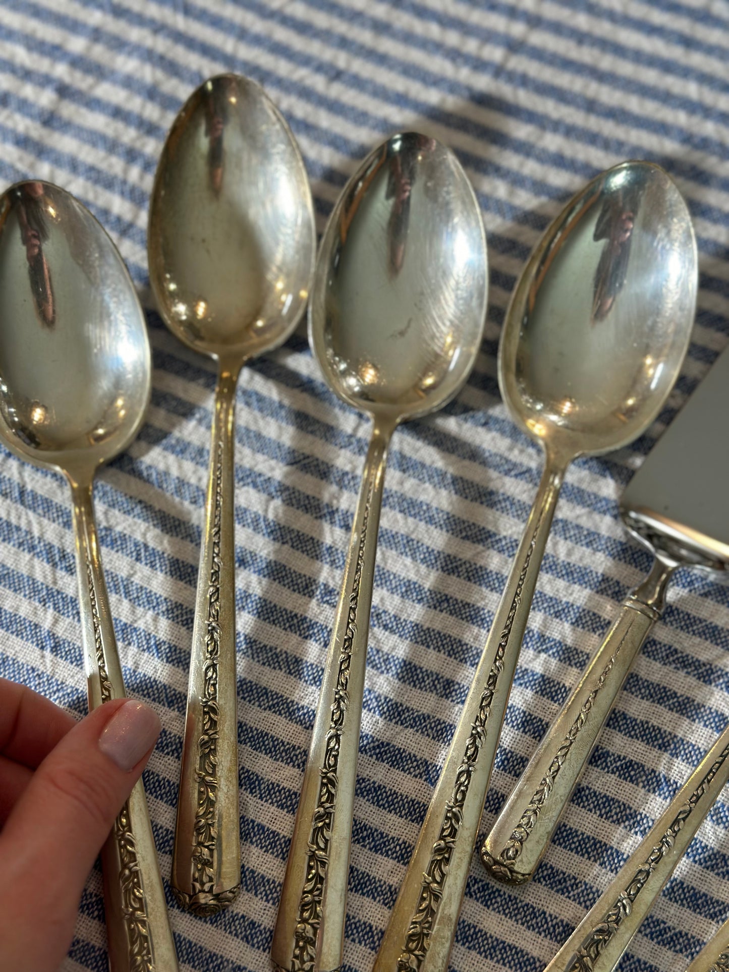 Antique Sterling “Ramker Rose” by Towle. 8 pcs. Total. Butter knife, pie server, (4) serving spoons, (2) meat forks included.