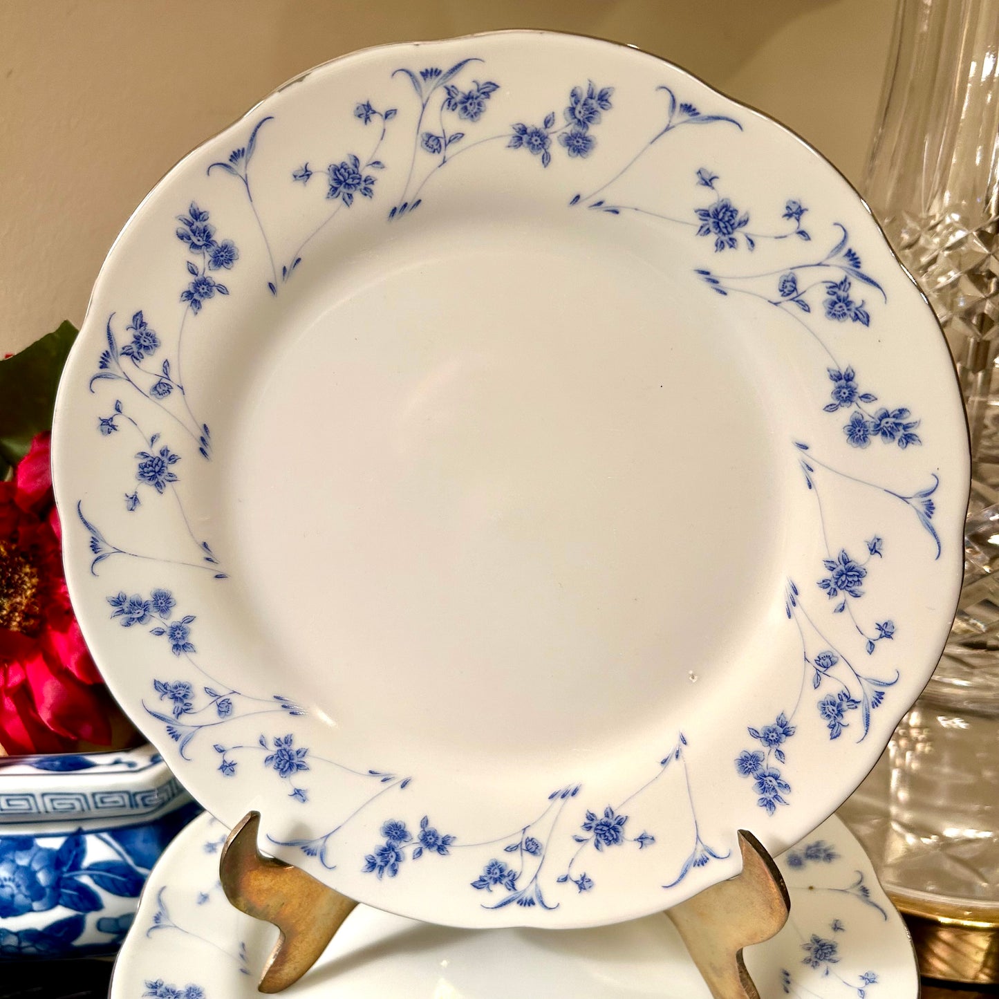 Set of 9 blue & white vintage floral porcelain dessert or salad plates.