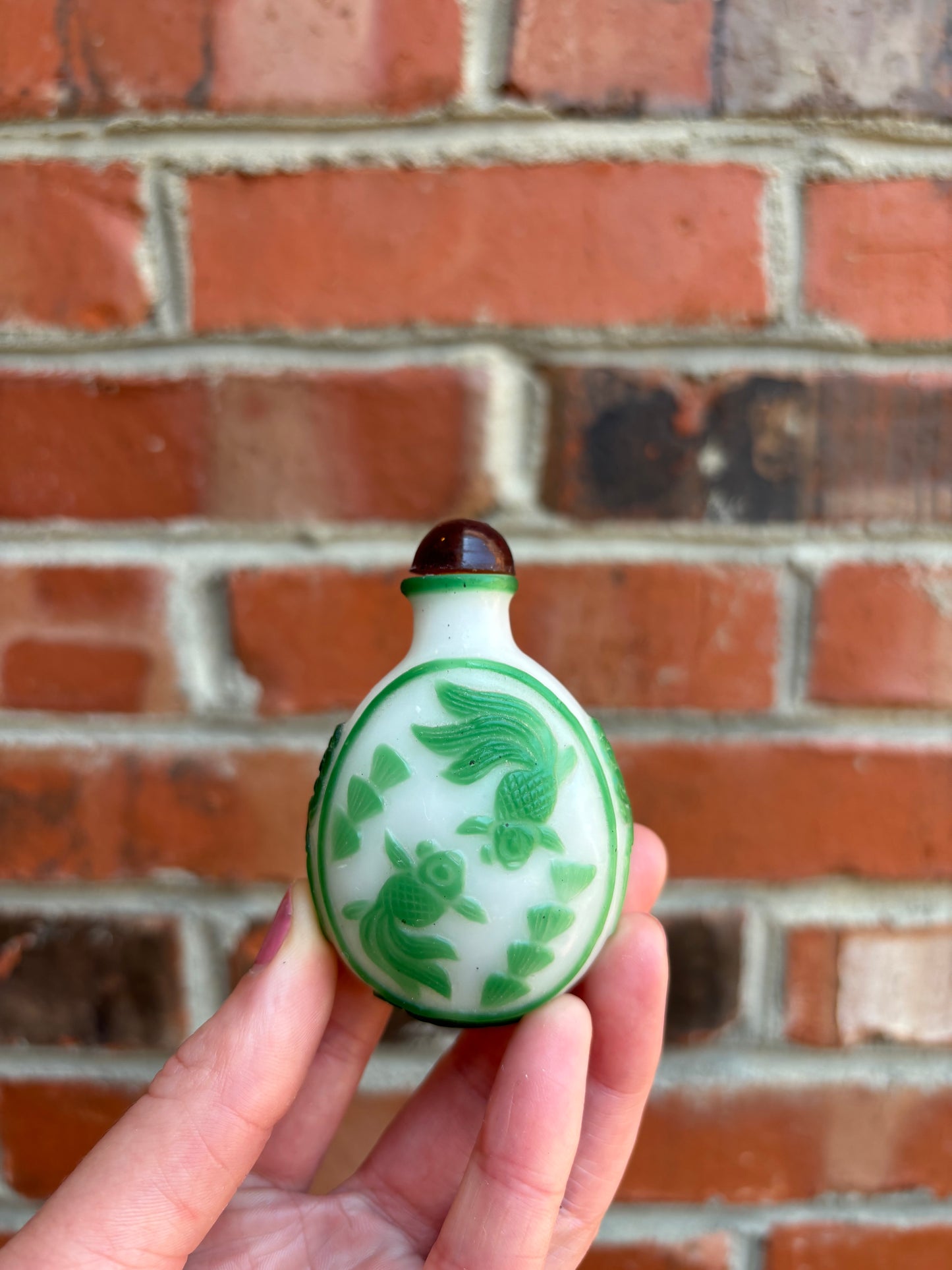 Collectible Chinese Snuff bottle with green overlay and fish!