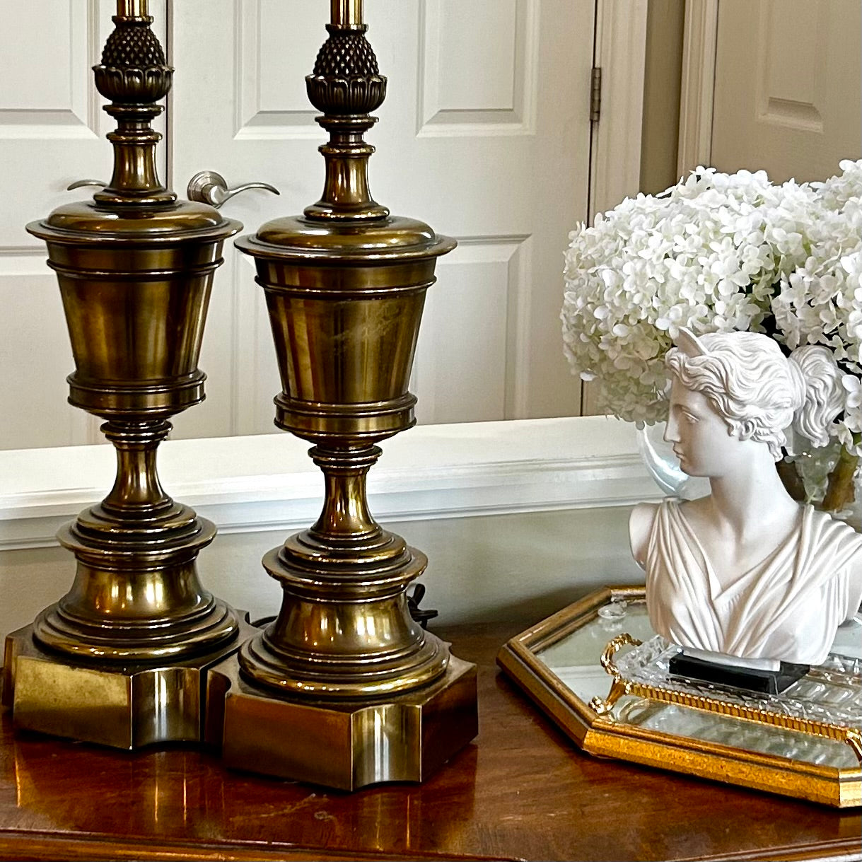 Absolutely stunning rare statuesque designer Stiffel acorn brass lamps