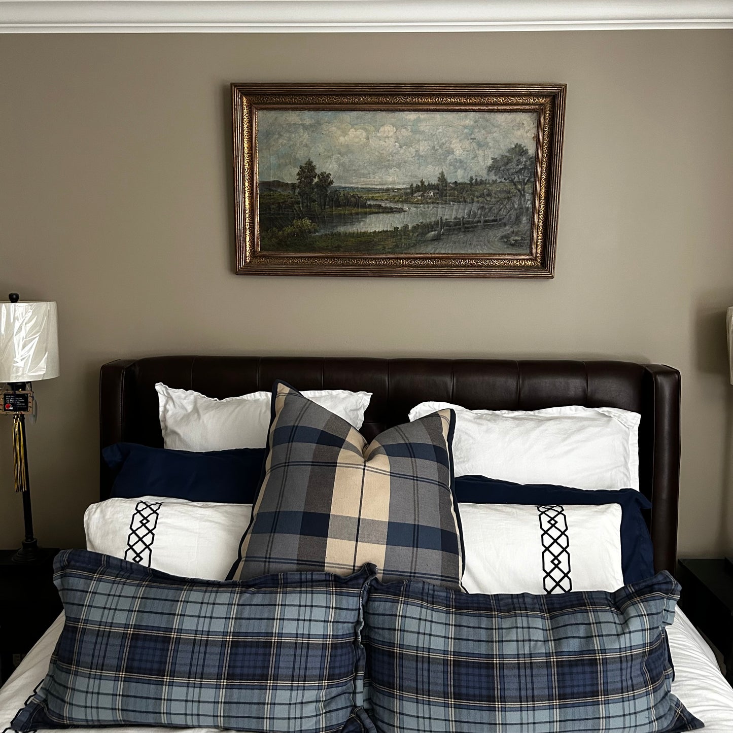 Set of three traditional plaid throw pillows.