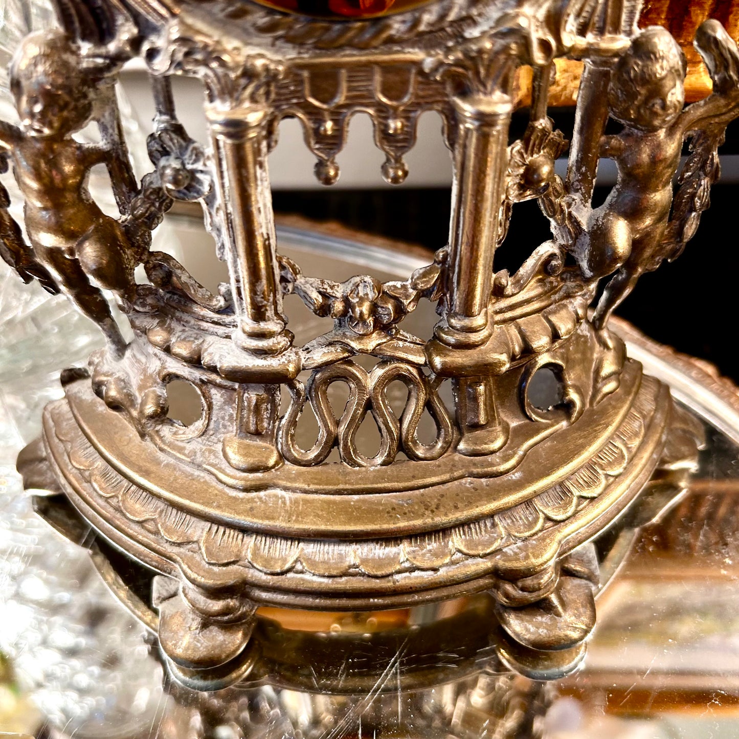 Gorgeous aged mantle clock dripping in details