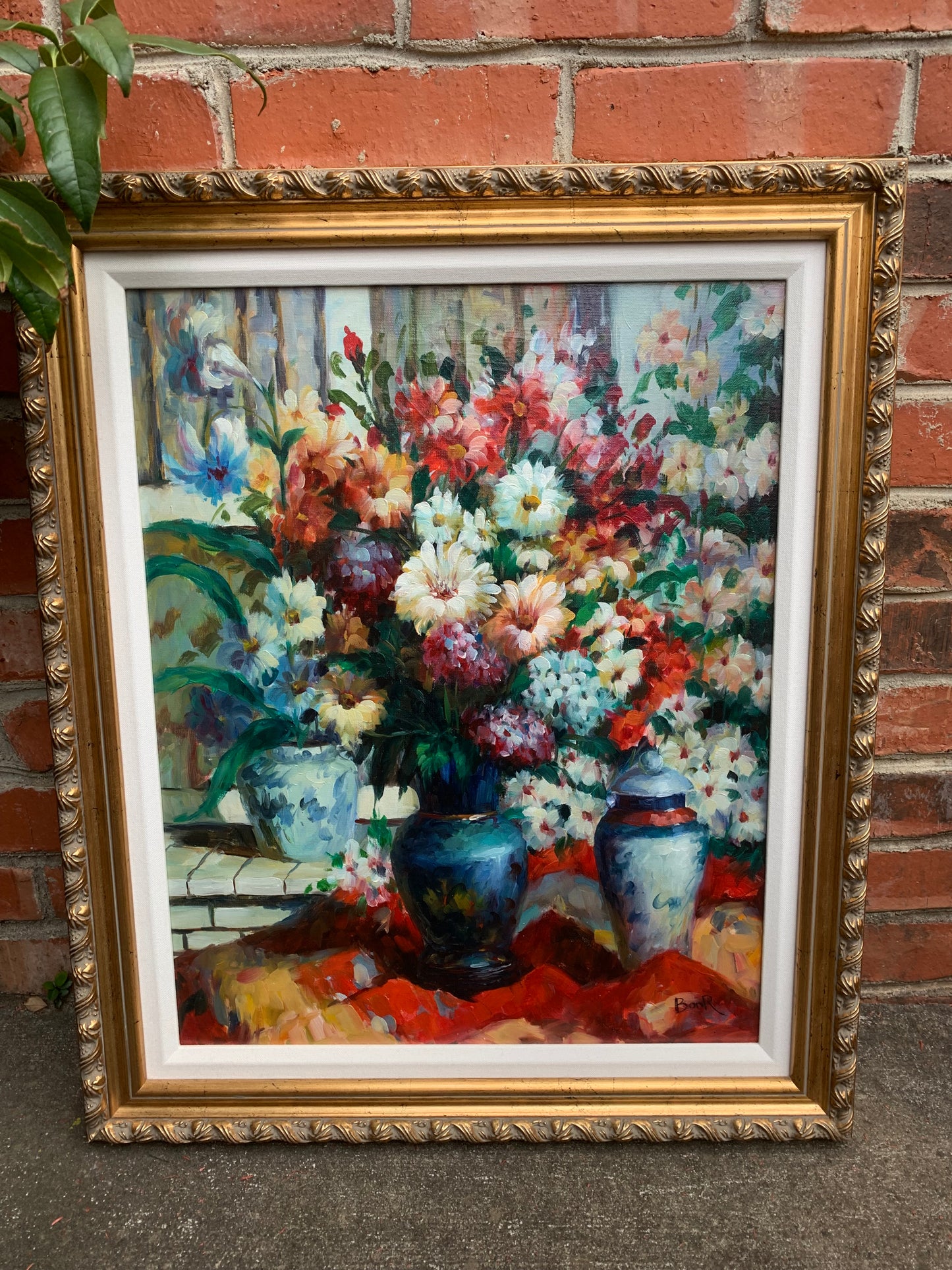 Stunning original bouquet floral art! Showcases beautiful vivid colors with blue and white vases in a ready to be hung ornate frame!