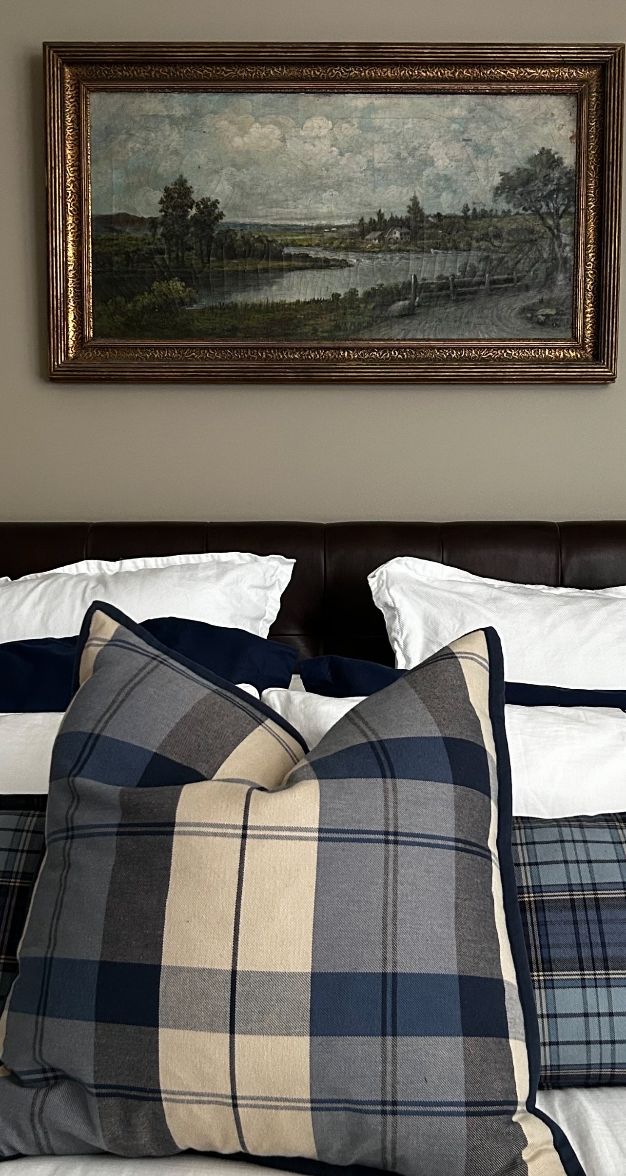 Set of three traditional plaid throw pillows.