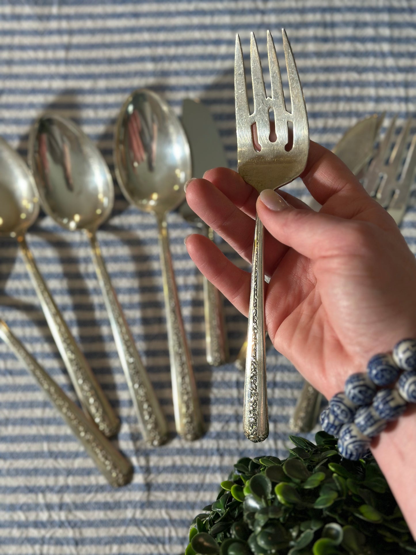 Antique Sterling “Ramker Rose” by Towle. 8 pcs. Total. Butter knife, pie server, (4) serving spoons, (2) meat forks included.