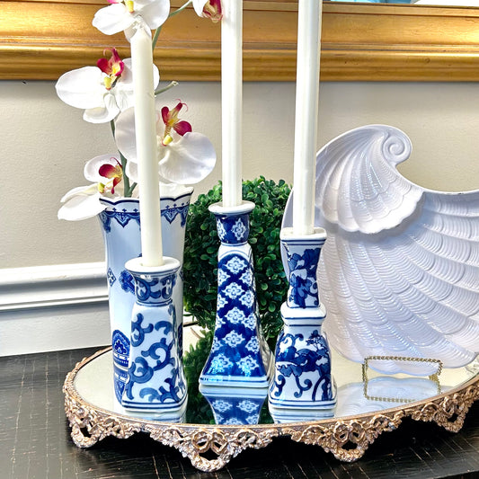 Set of 3 blue & white chinoiserie tall candlesticks.
