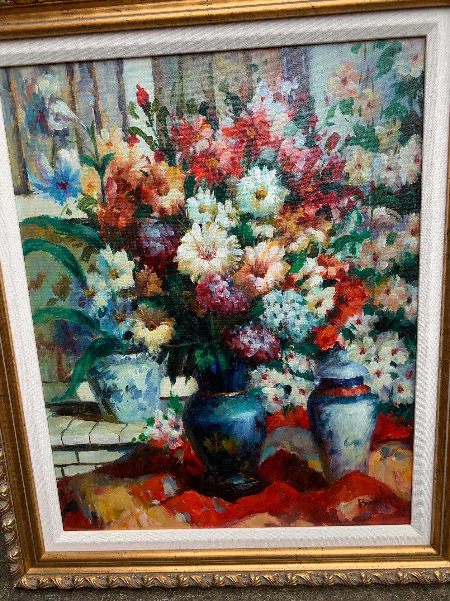 Stunning original bouquet floral art! Showcases beautiful vivid colors with blue and white vases in a ready to be hung ornate frame!