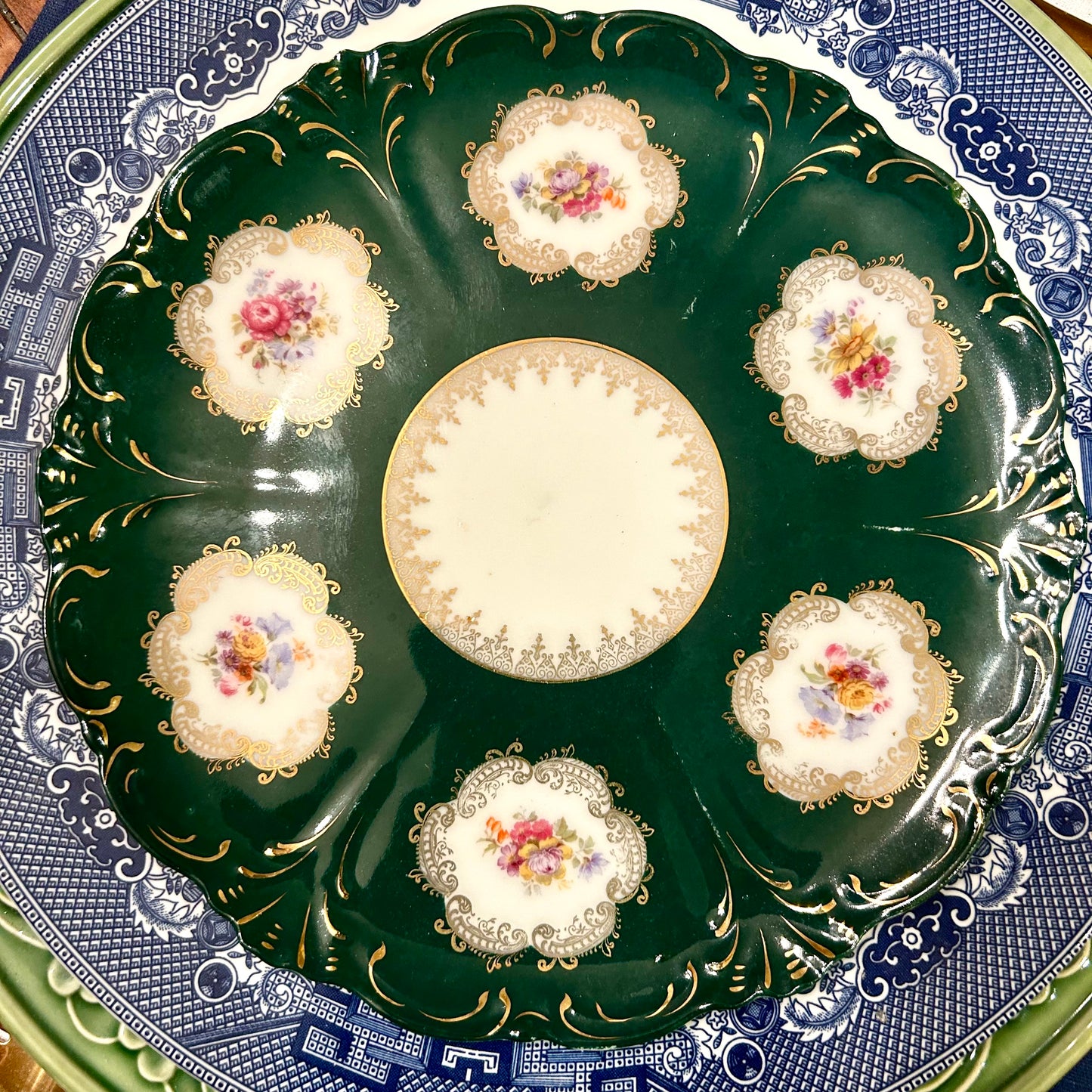 Handsome emerald green floral botanical porcelain plate.