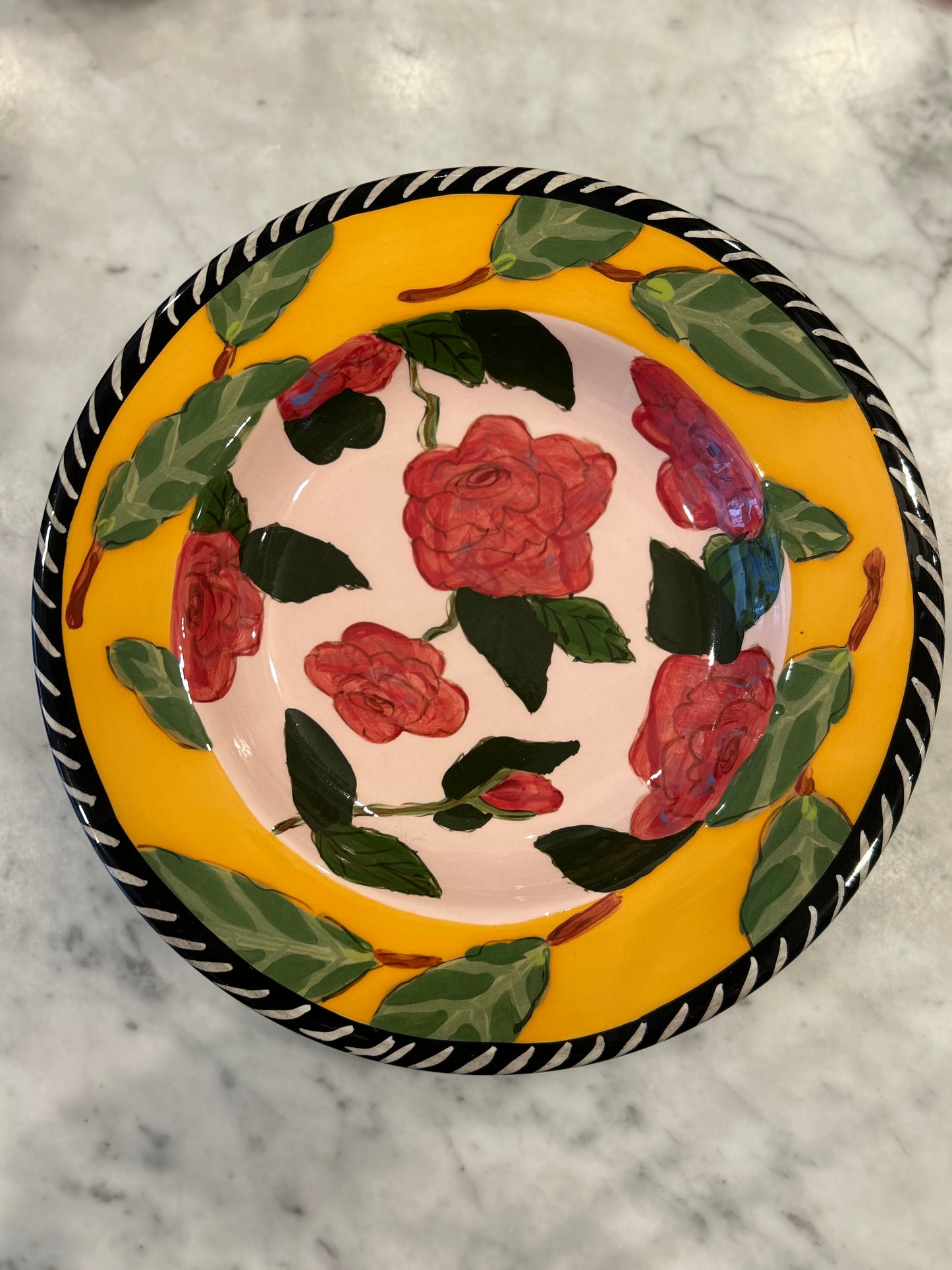 Pink Background Hand Painted Droll Design Deep Dish 12 1/4”