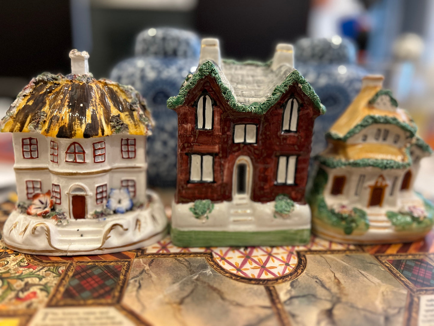 Antique Staffordshire cottage with a slot in back for Coins!