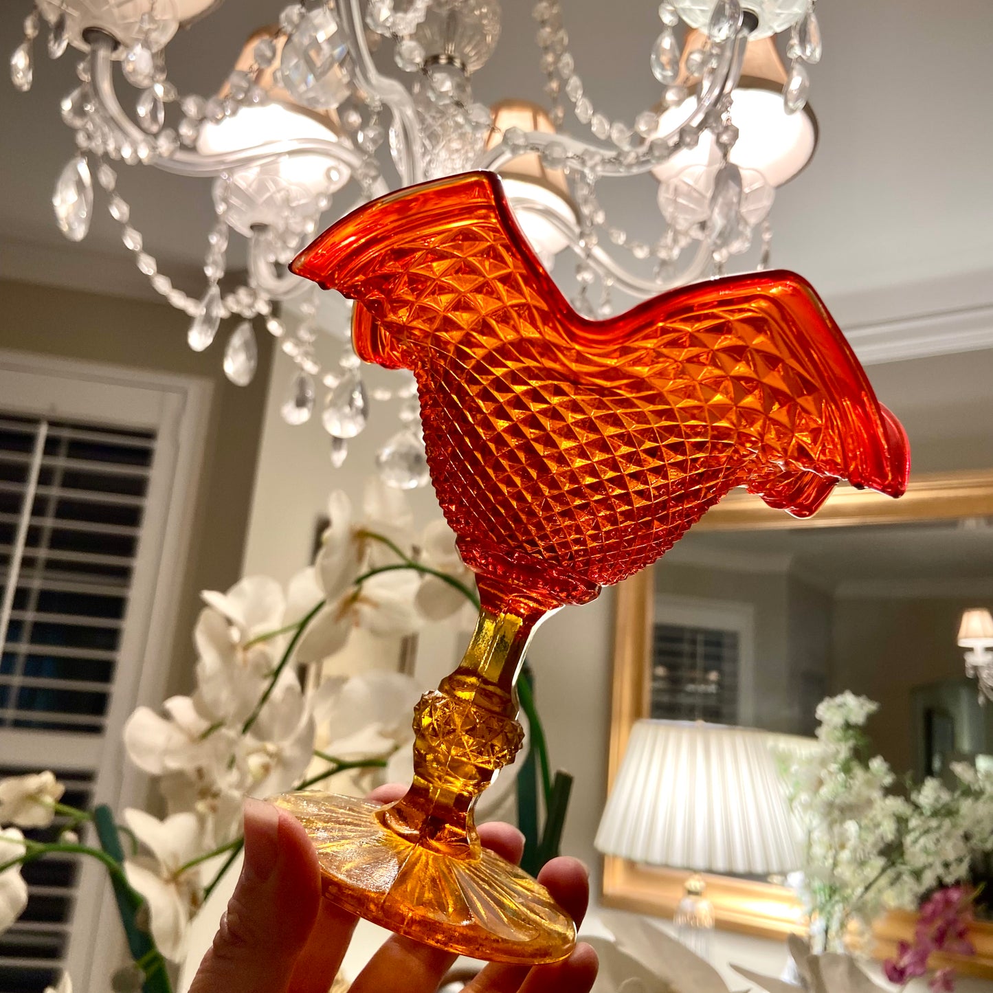 Warm vintage amber orange colored glass footed dish.