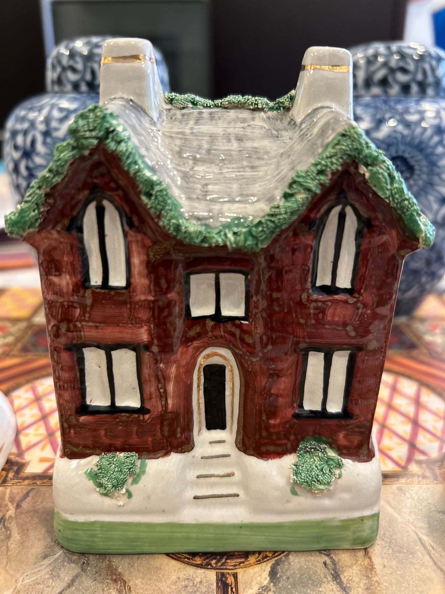 Antique Staffordshire cottage with a slot in back for Coins!