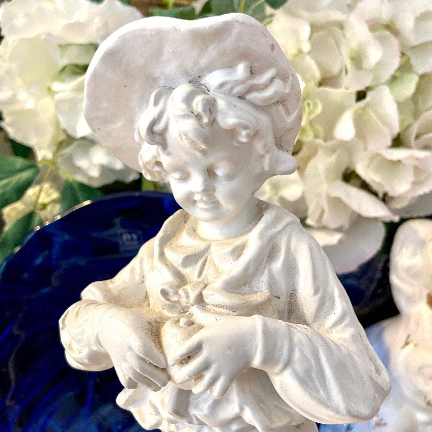 Set of vintage whimsical Girl & Boy statues